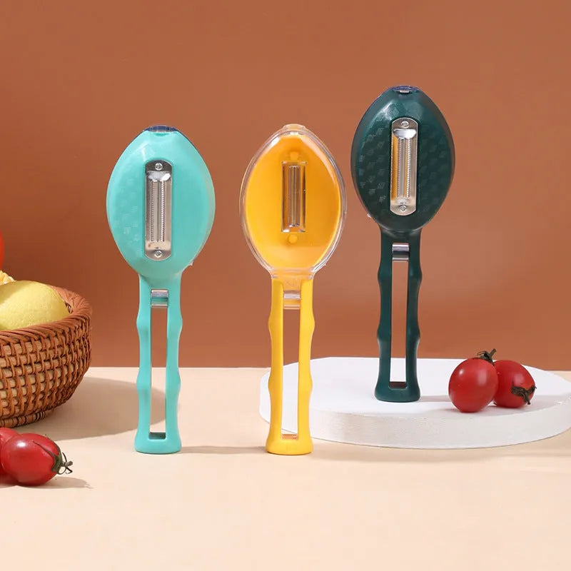Yellow peeling knife with a stainless steel blade and a matching plastic storage lid on a kitchen worktop.