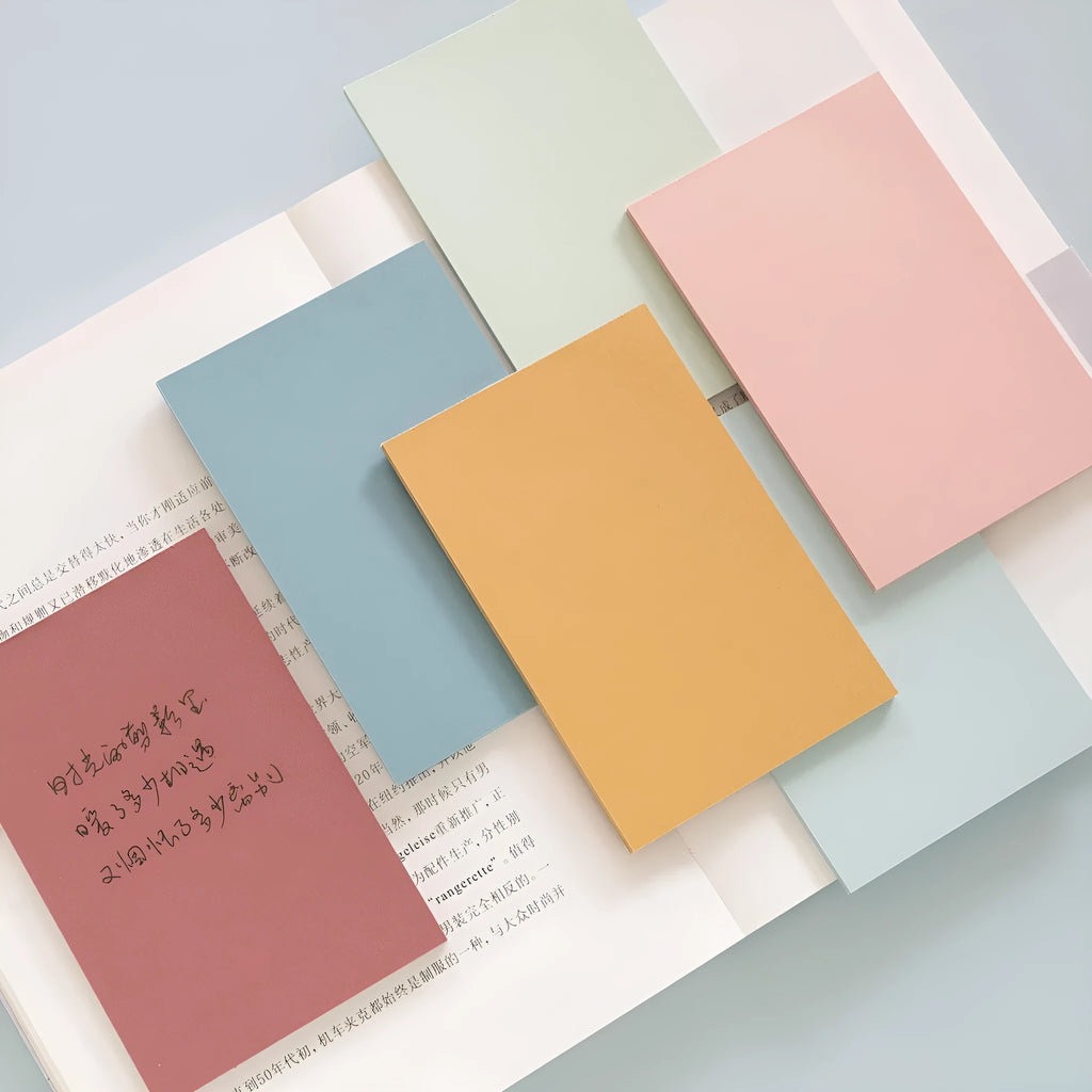 Large self-adhesive sticky notes in six colours measuring 12cm by 8cm, pack of 150 sheets for organisation