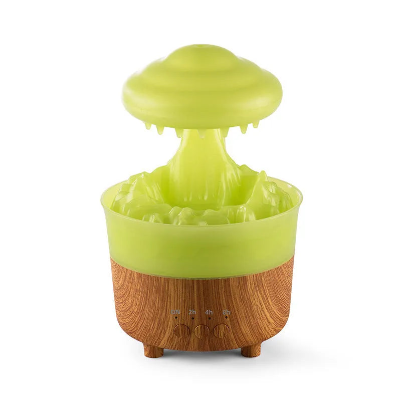 Wood grain white rain cloud-shaped ultrasonic humidifier diffuser with LED lights on a table.
