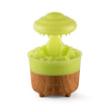 Wood grain white rain cloud-shaped ultrasonic humidifier diffuser with LED lights on a table.