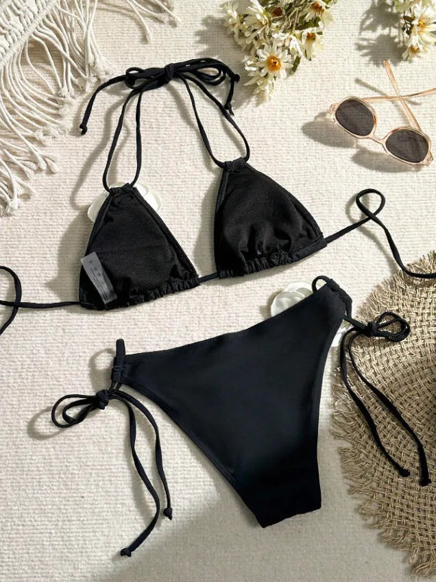 Black women's two-piece bikini with 3D floral lace detail on drawstring waistband, backless design.