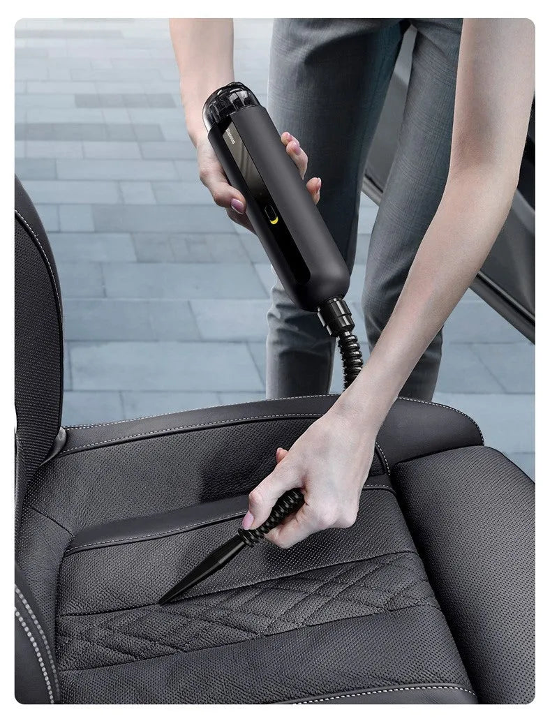 Baseus handheld car vacuum cleaner in black, white, or green next to a dust bin and blowing hose.