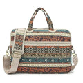 Canvas laptop sleeve with printed pattern for 13-15 inch notebooks, plush lining, and padded shoulder strap