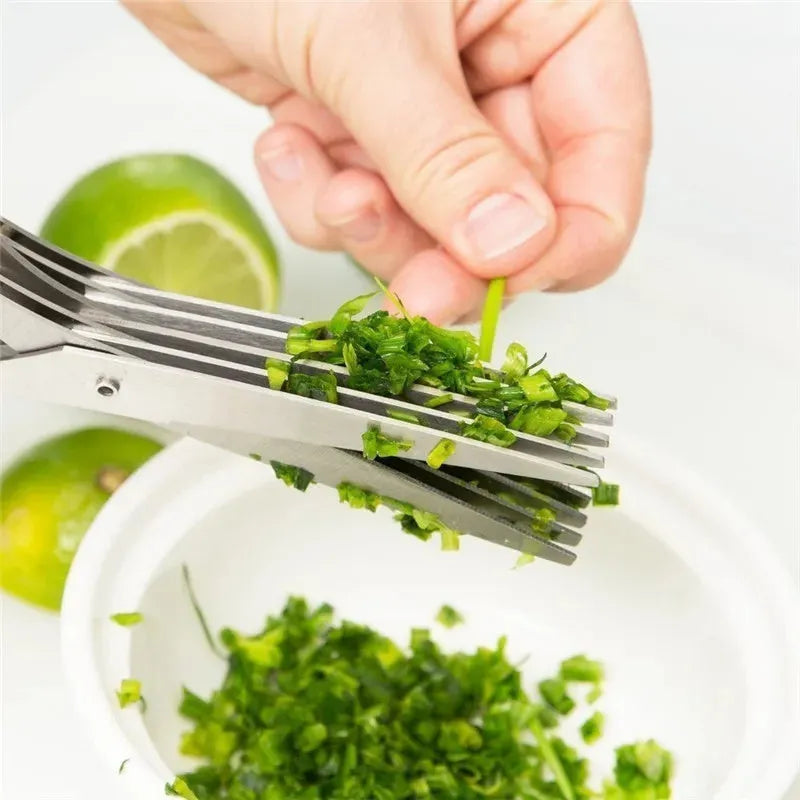 Stainless steel multi-layer herb scissors with green handles for chopping green onions and seaweed.