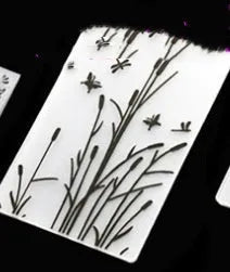 Plastic folding cake decorating mould showing windmill and five-pointed star design options