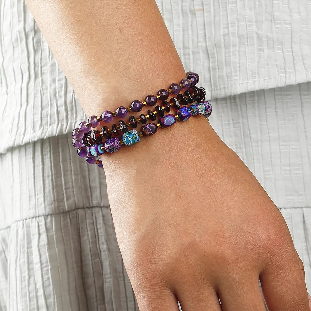 Handcrafted purple amethyst and garnet stone bracelet with geometric bead arrangement