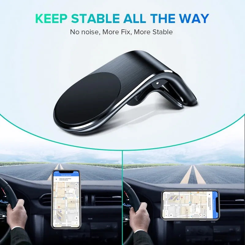 Car phone bracket mounted on vehicle air vent in silver finish showing rotation adjustment