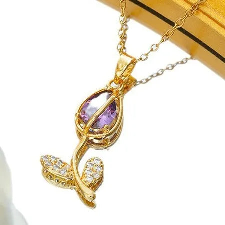 Zircon tulip flower pendant necklace for women on an O-ring chain, shown in a gold colour finish.
