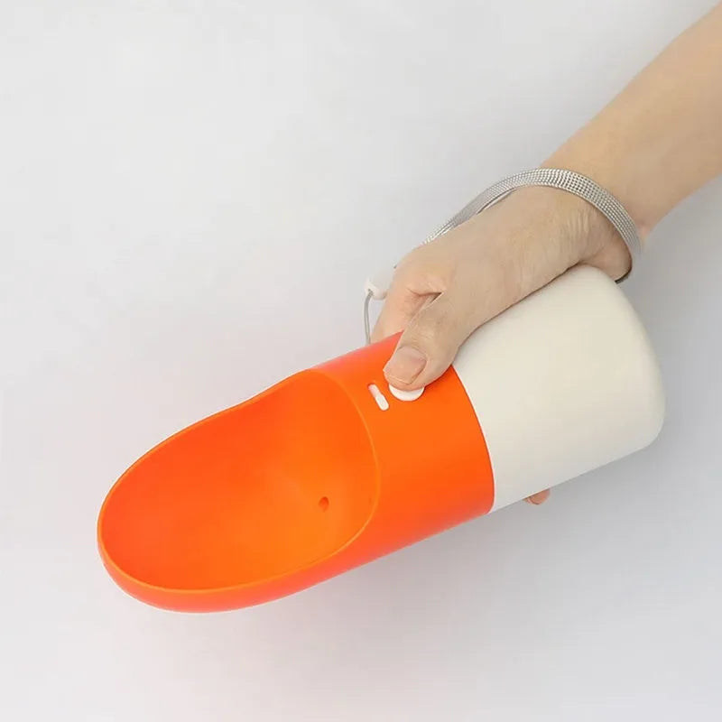 White Moestar Rocket Pet Cup with grey accents, showing the water outlet and one-button lock on a portable dog water bottle.