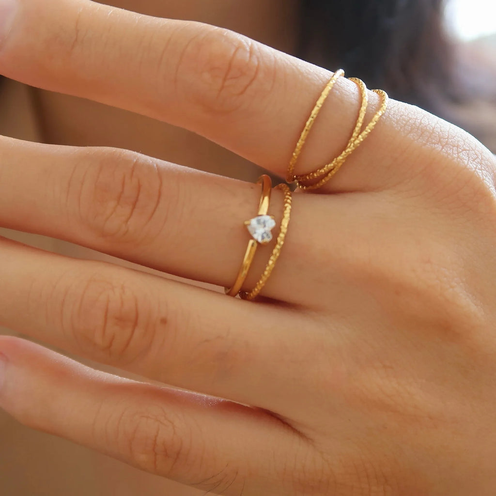 Stainless steel heart shape ring with electroplated golden finish in Golden Heart or Golden Oval colour option