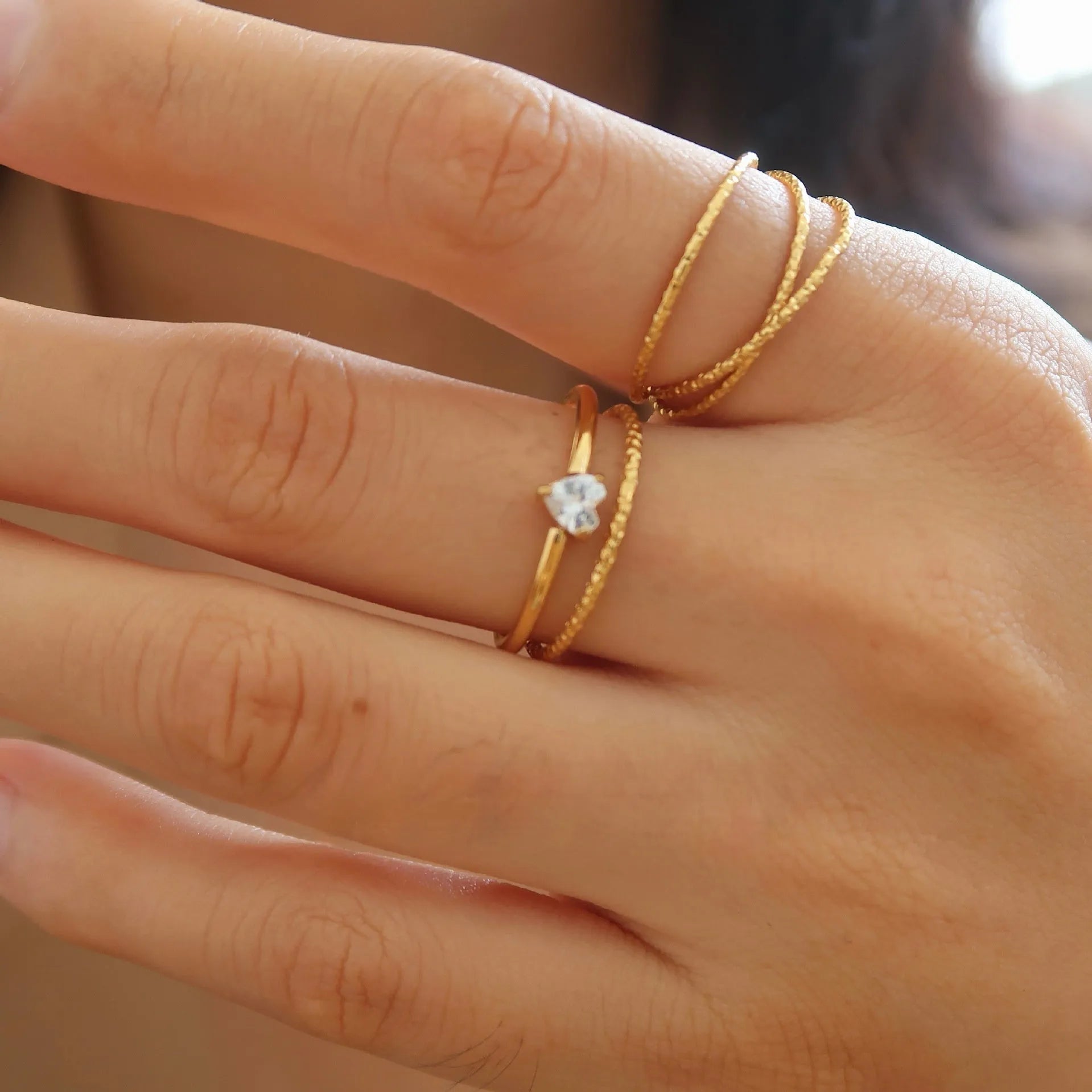Stainless steel heart shape ring with electroplated golden finish in Golden Heart or Golden Oval colour option