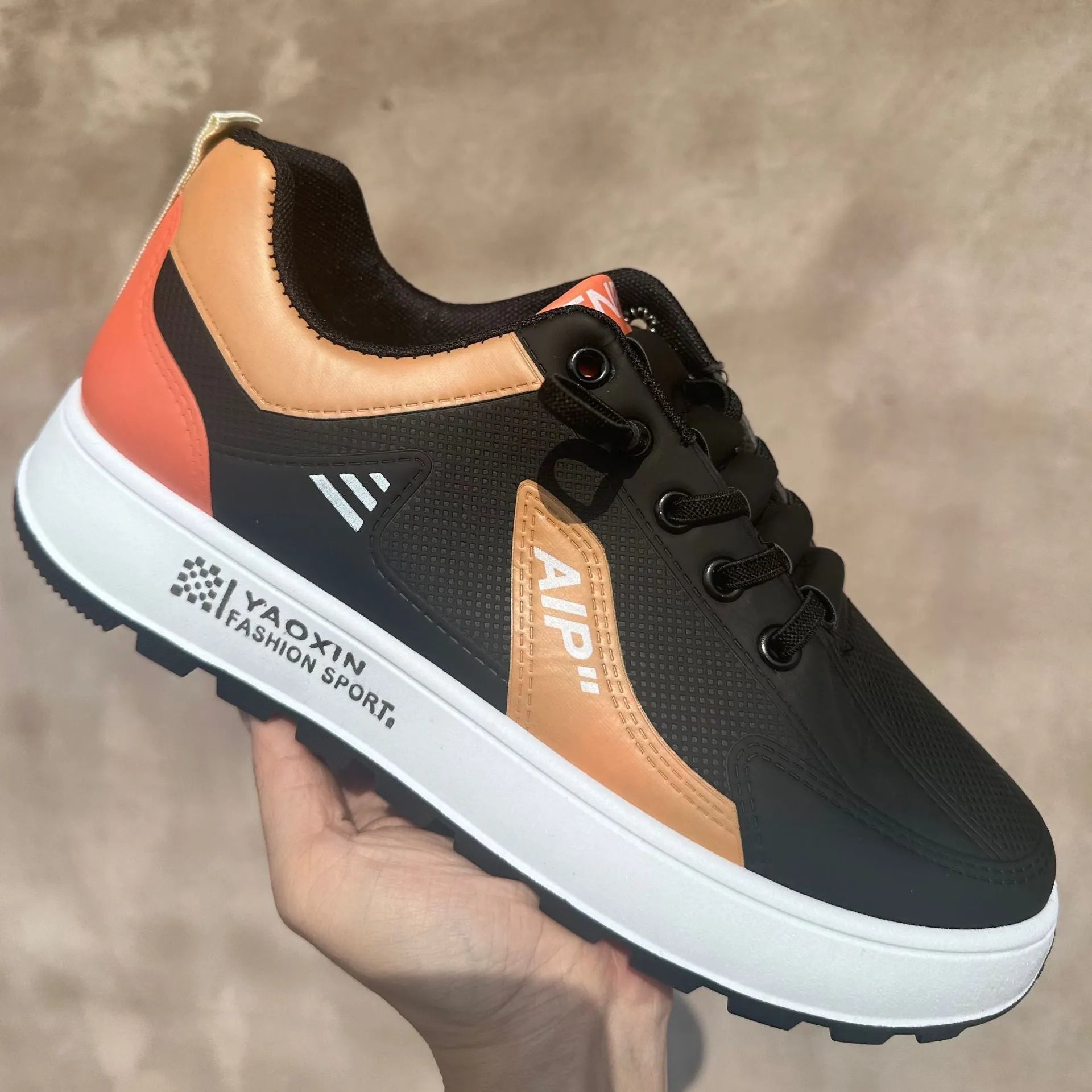 Men's white and orange round toe casual shoes made from artificial PU material
