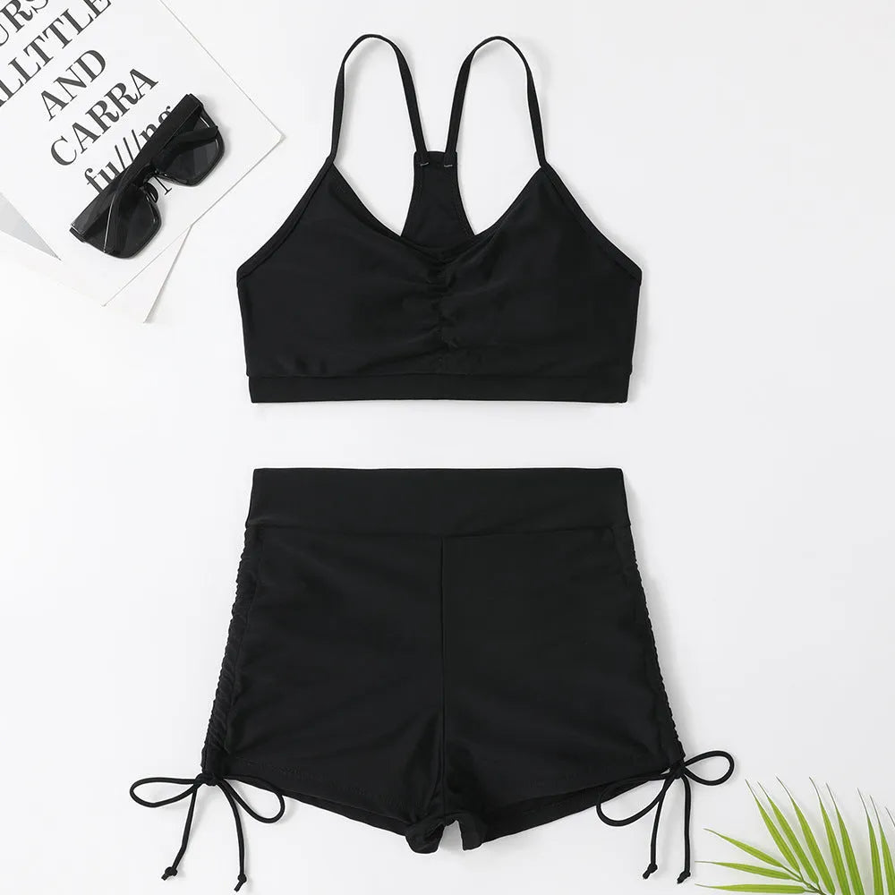 Women's high waist split swimsuit bikini set in purple or black, made from nylon and spandex.