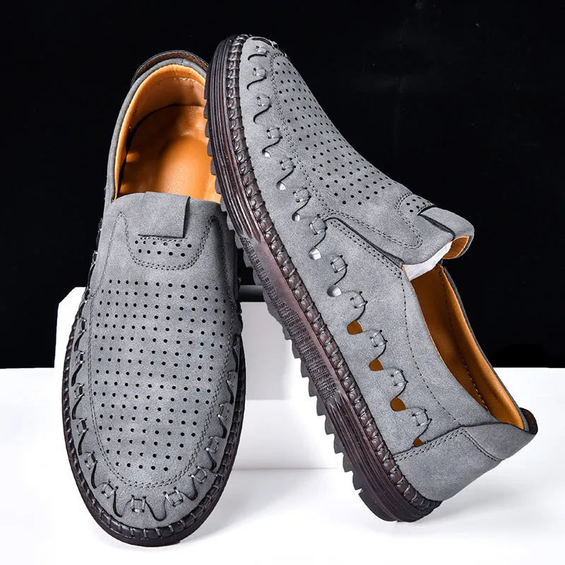 Men's brown artificial PU slip-on casual shoes with leather lining and flat sole.