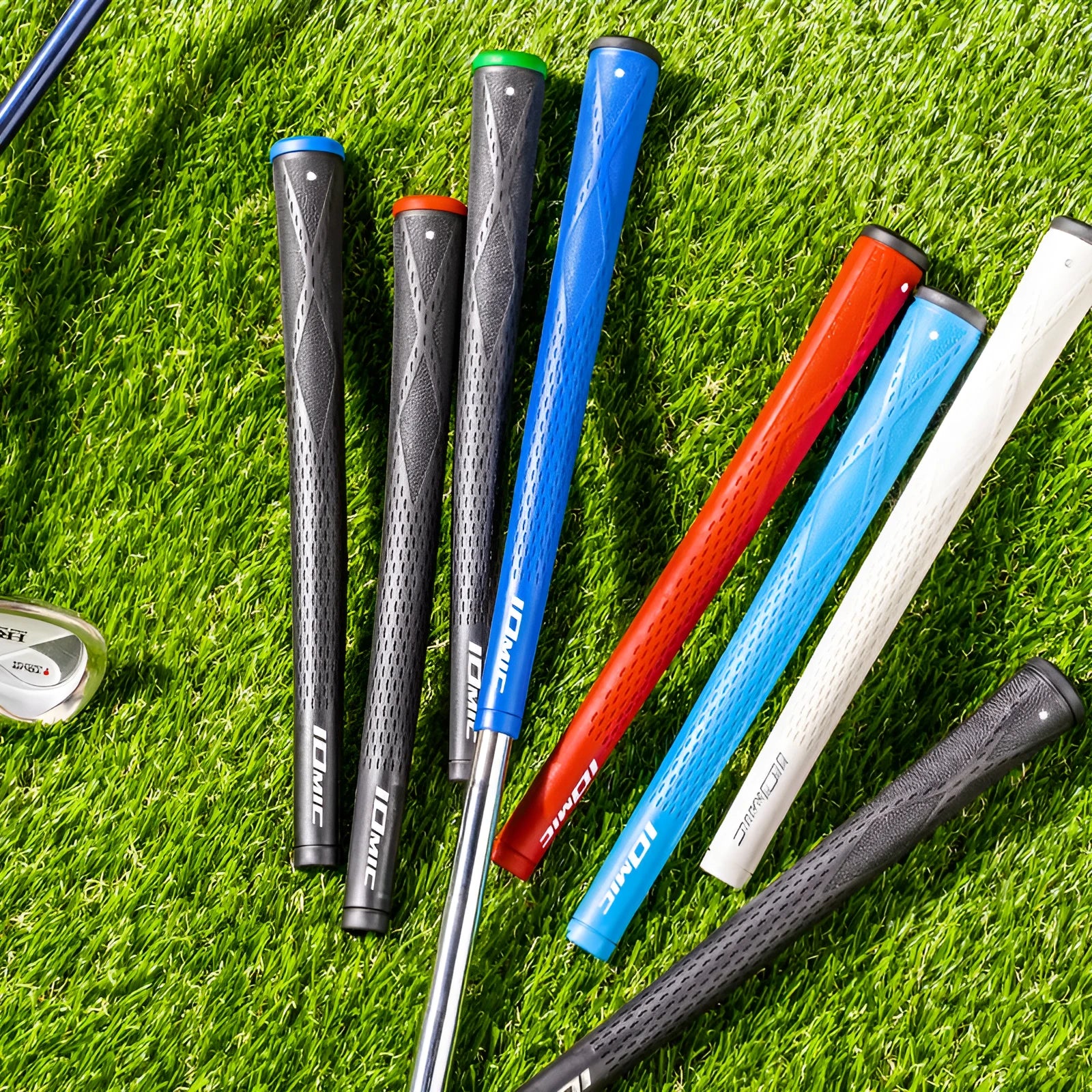 TPE material golf grip shown in various colour options including pink, red, and black.