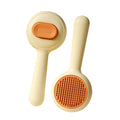 Green and yellow cat grooming brushes with stainless steel teeth and non-slip handles for pet hair removal