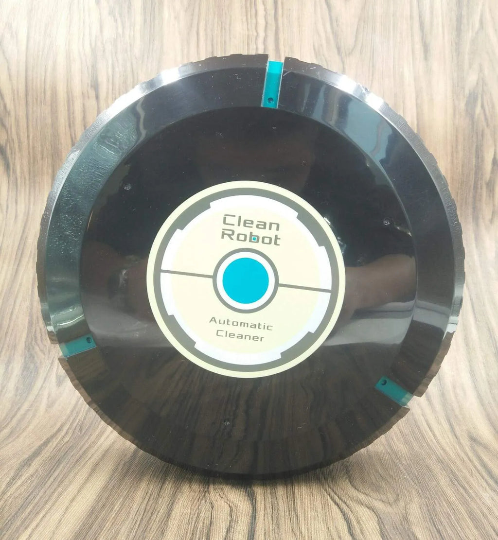 Black and white ABS plastic automatic robot vacuum cleaner on a wooden floor.