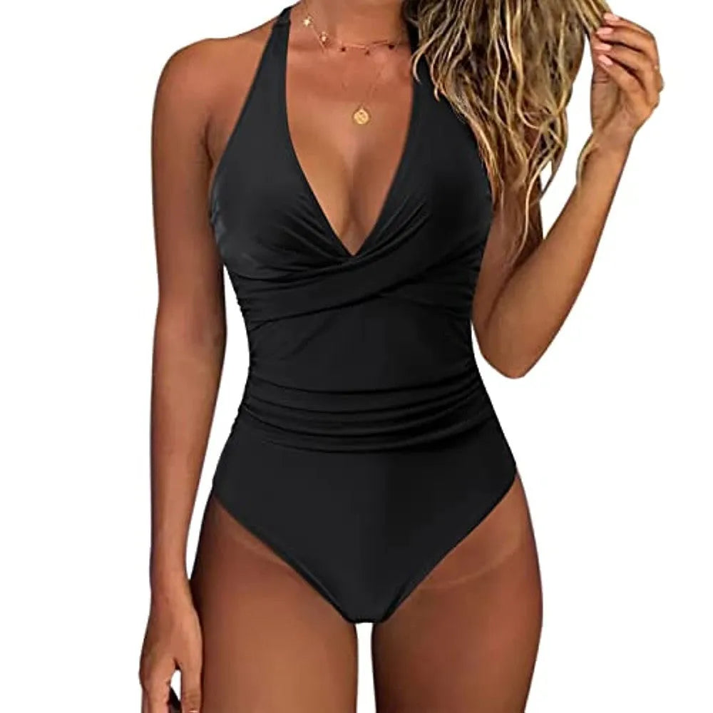 Women's solid colour one-piece swimsuit with cross front design in polyester fabric.