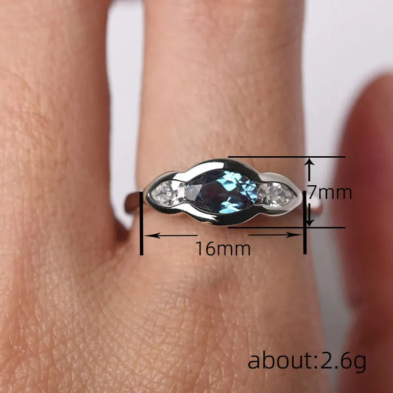 Women's geometric ellipse ring with inlaid zircon stones in white gold colour