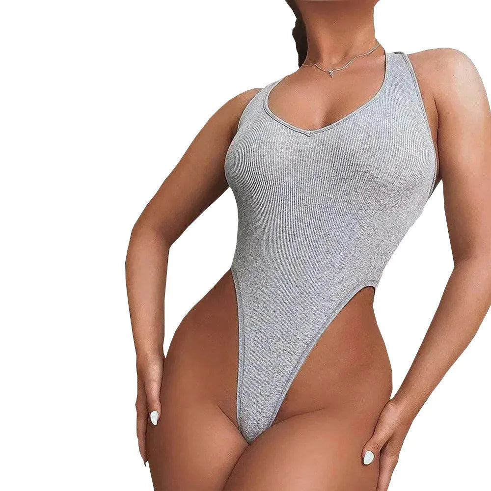 Grey viscose halter neck jumpsuit with suspenders and high-waisted shorts on a mannequin