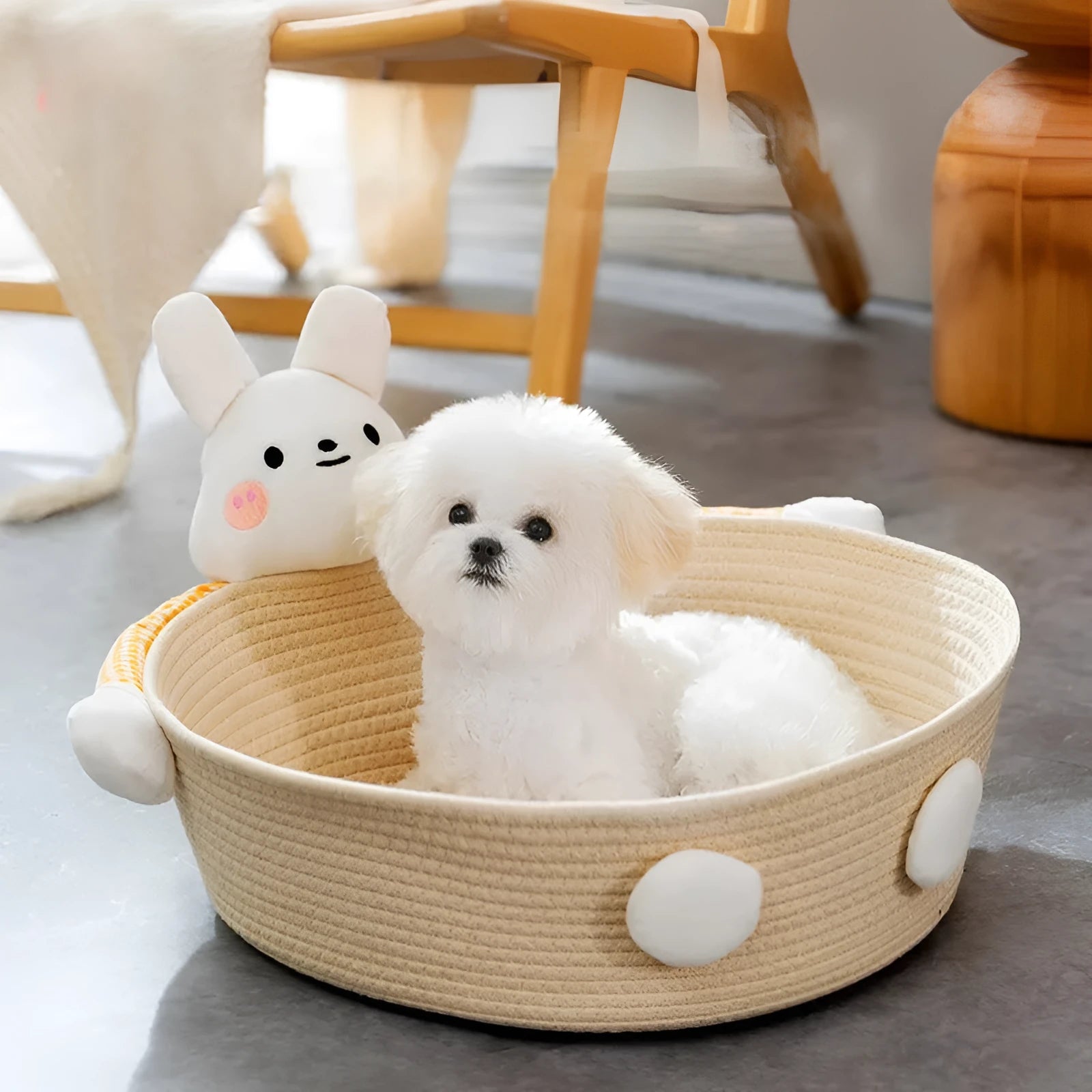 Woven cotton rope cat bed with integrated scratching surface in rabbit motif