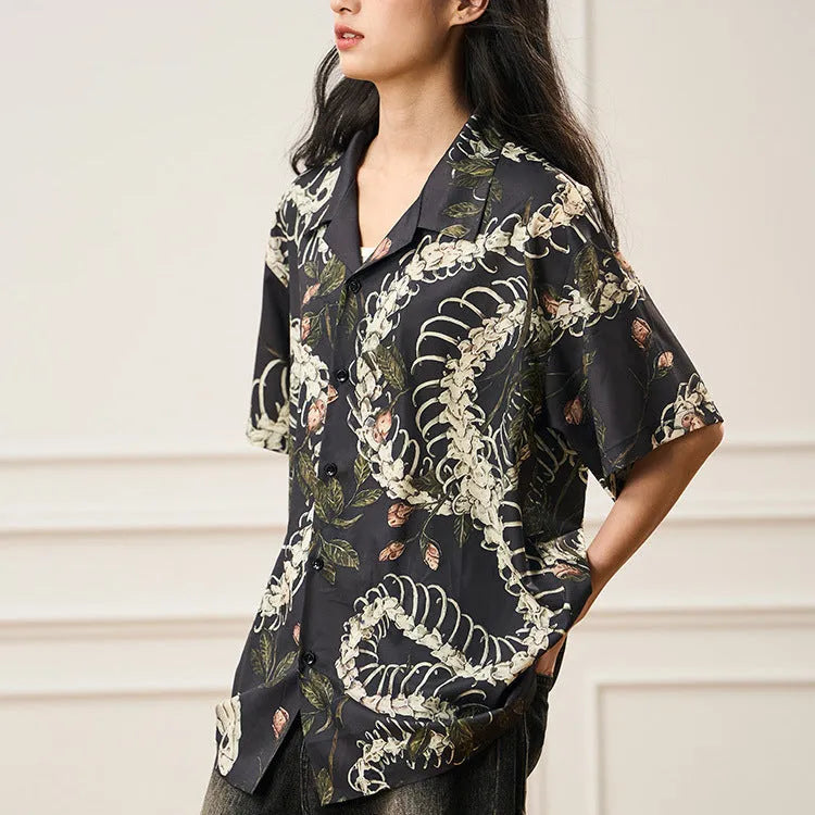 Men's loose fit short sleeve shirt with snake bone floral print and a Cuban collar.