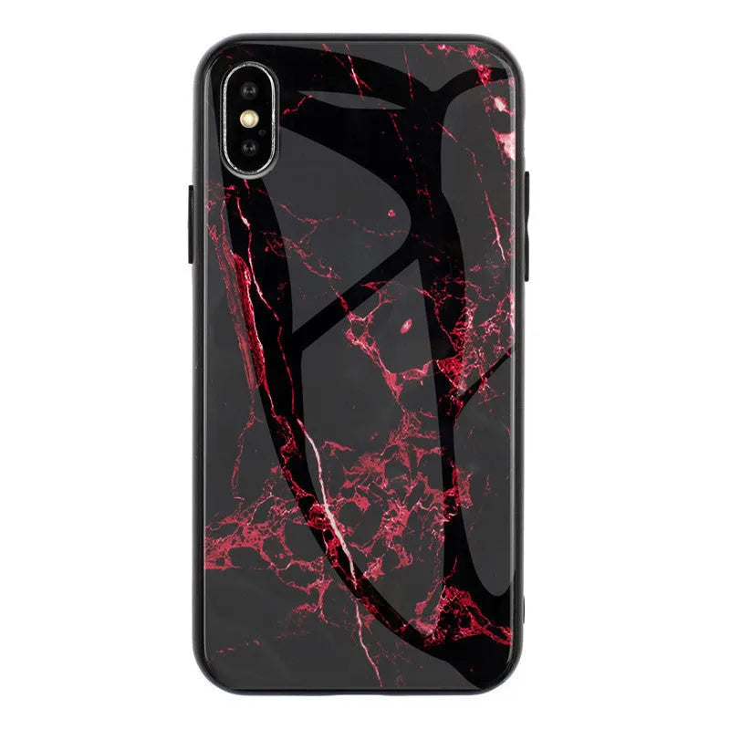 Clear marbled glass design Huawei phone case with cartoon pattern on a table.