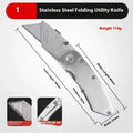 Stainless steel folding art knife with a black blade, shown with a set of long and trapezoidal spare blades.