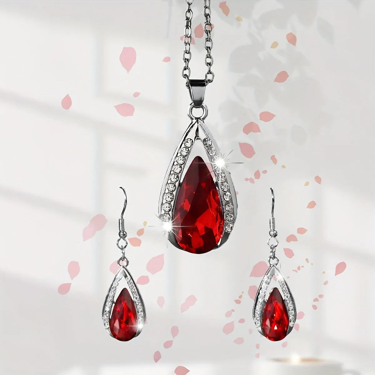 Black and red teardrop glass pendant alloy necklace and matching earrings set.