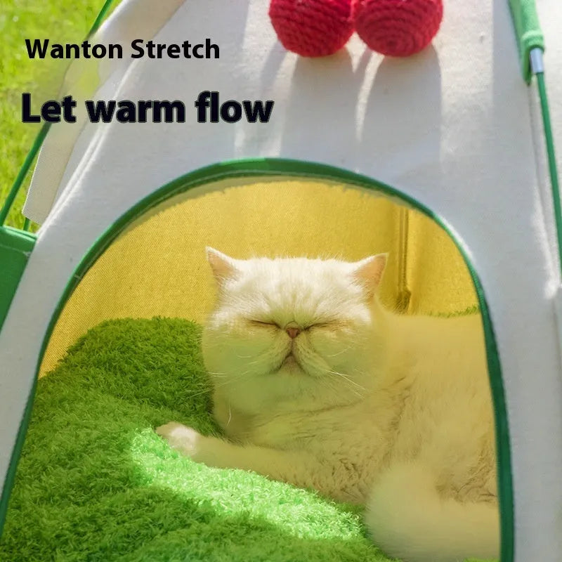 Grey dome-shaped cloth cat tent with a thick padded floor inside, set on a carpet.