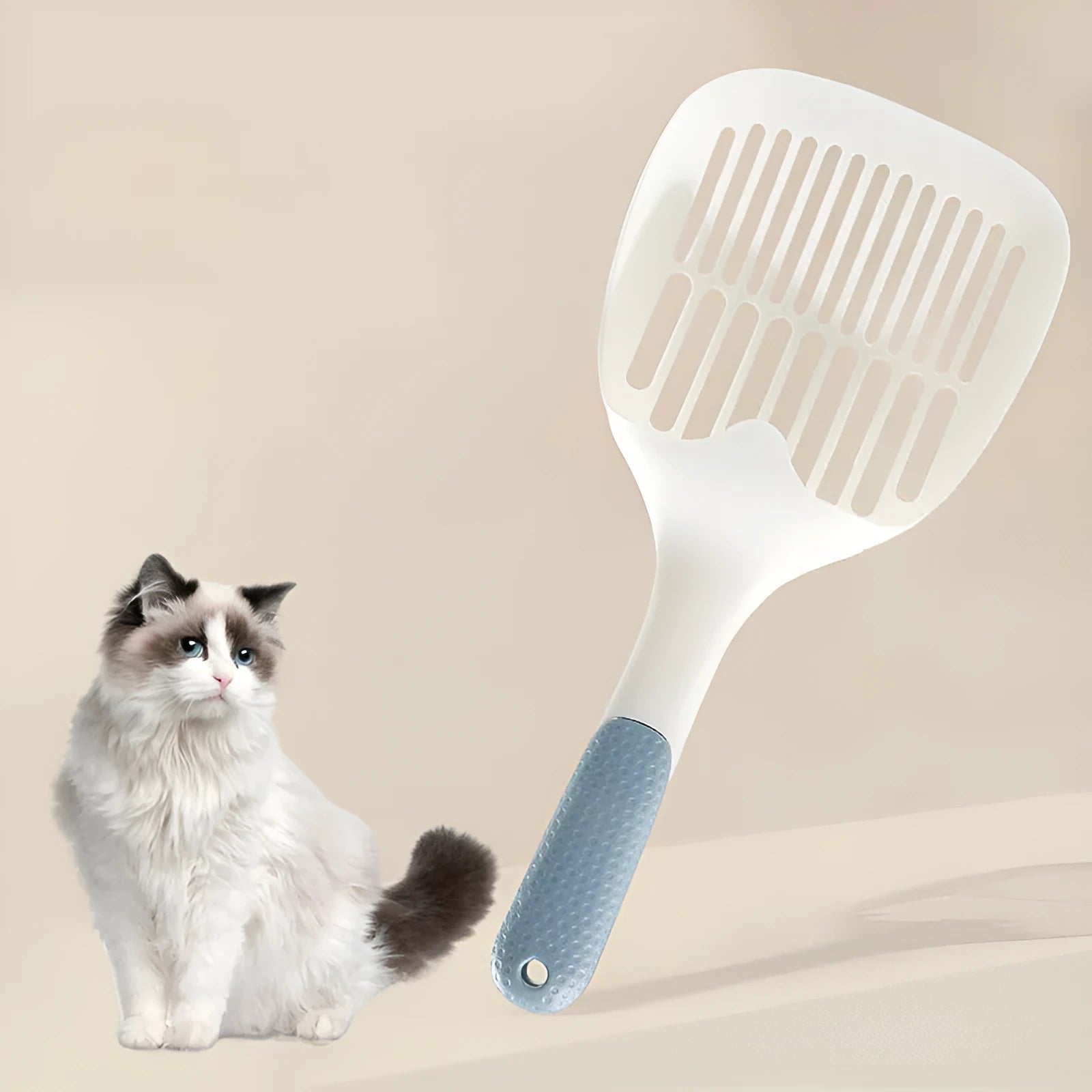 Large white plastic cat litter shovel with slotted drainage holes on a 22cm wide scoop
