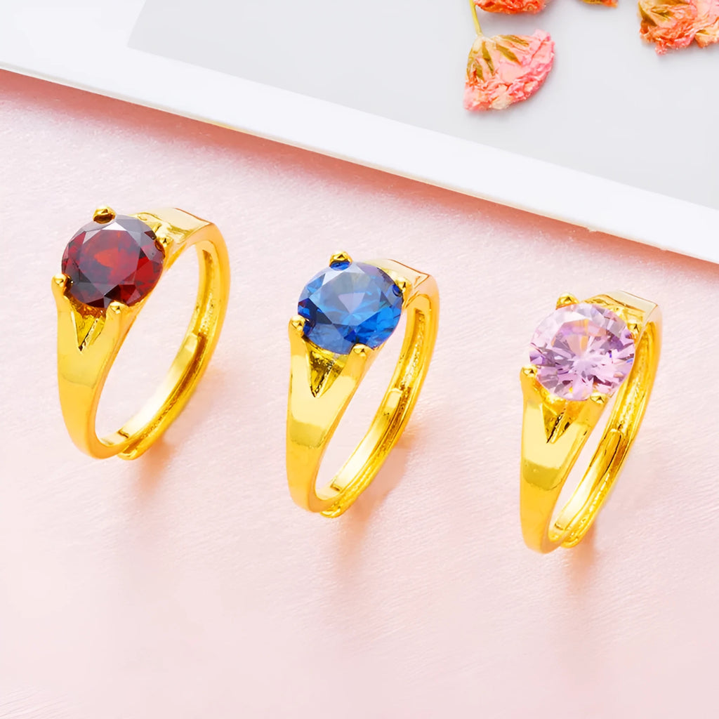 Women's adjustable copper ring with placer gold zircon stone, shown in multiple colour options.