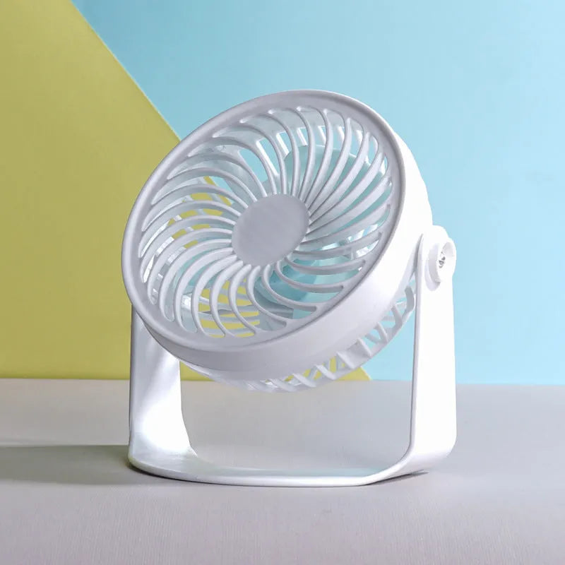 Mini USB desk fan shown in clip-on and floor-standing styles on a wooden desk.