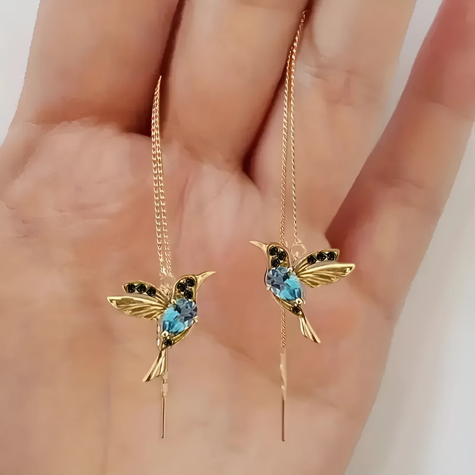 Personalised long drop earrings with bird charm and zirconium wing accents in electroplated colours