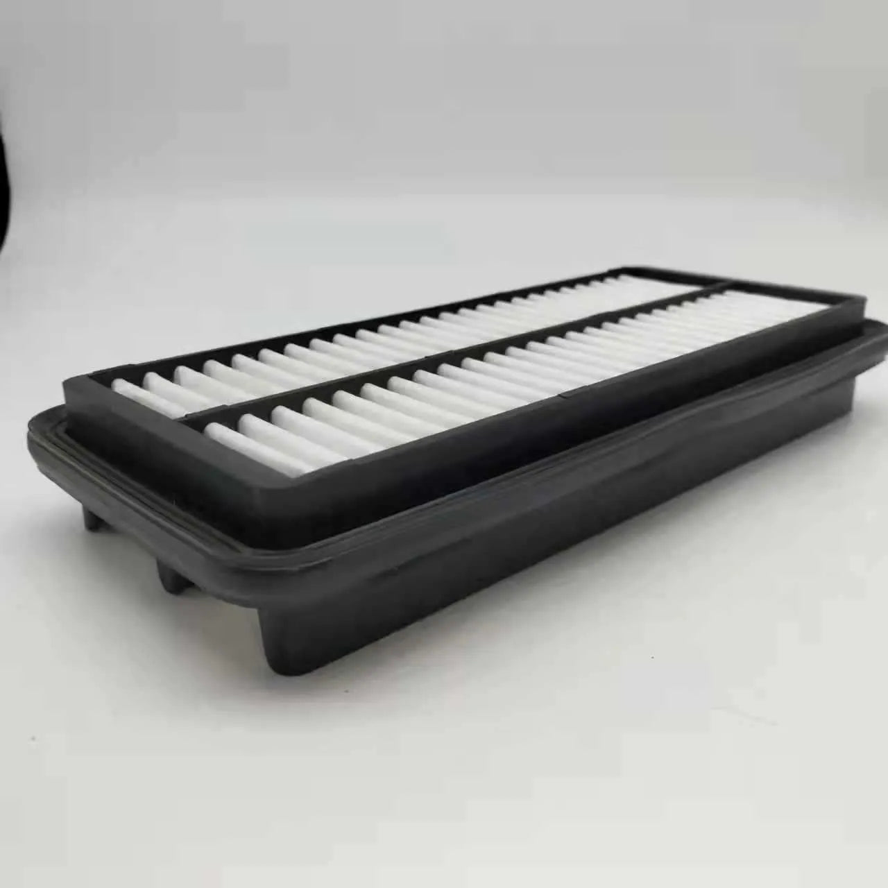 Black rectangular car panel air filter with dimensions 256mm by 113mm by 40mm