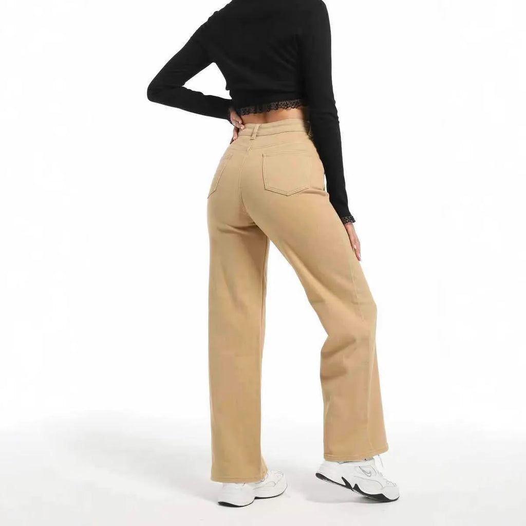 Women's apricot high-waist wide-leg jeans made from stretch cotton, laid flat.