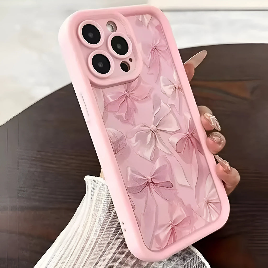 Pink matte silicone phone case with bow for iPhone 16