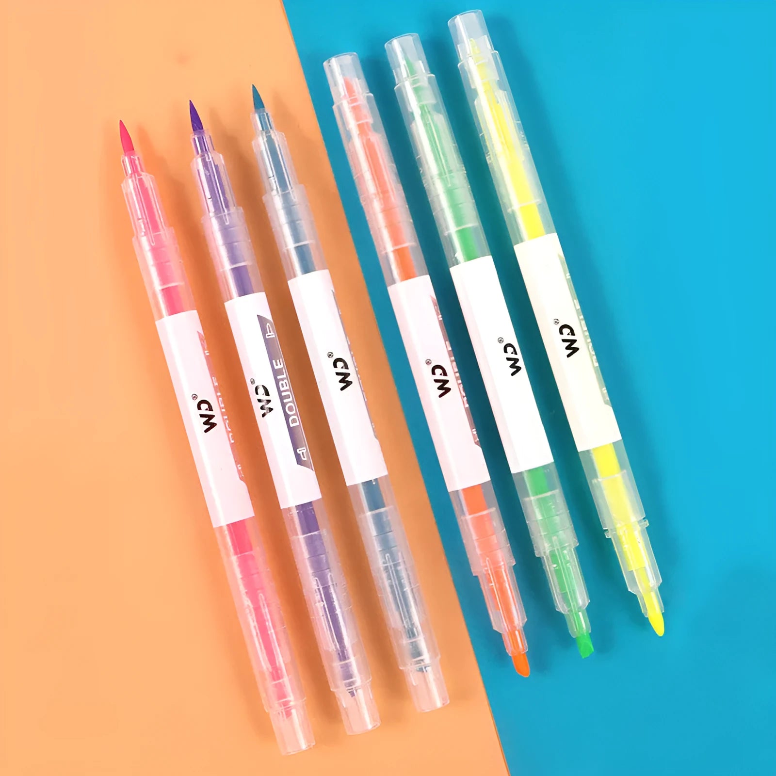 Set of six double-headed marker pens showing round and oblique tips in various colours