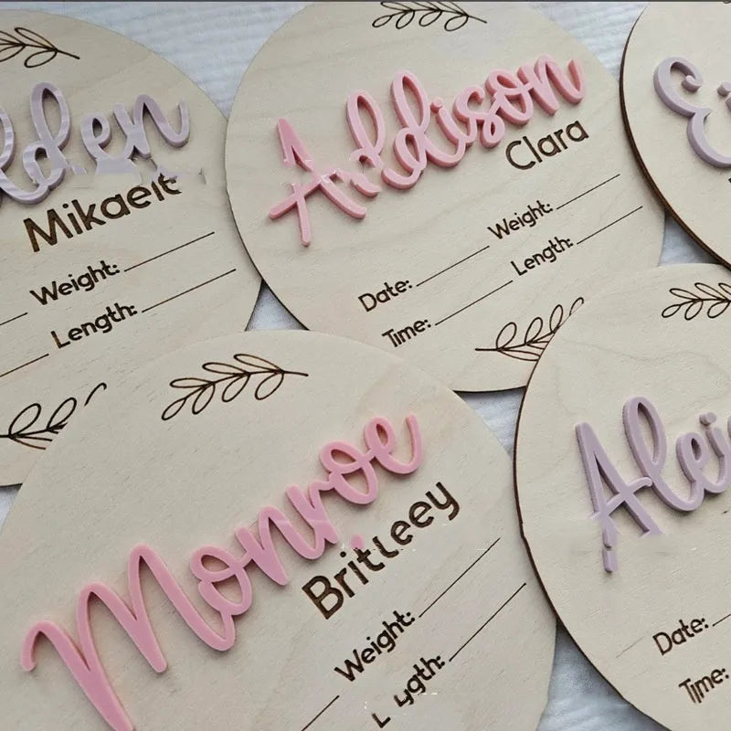 Square plywood newborn name label showing baby birth information, 15cm wide.