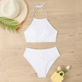 Women's high-waist apron-style conservative two-piece swimsuit in a solid colour.