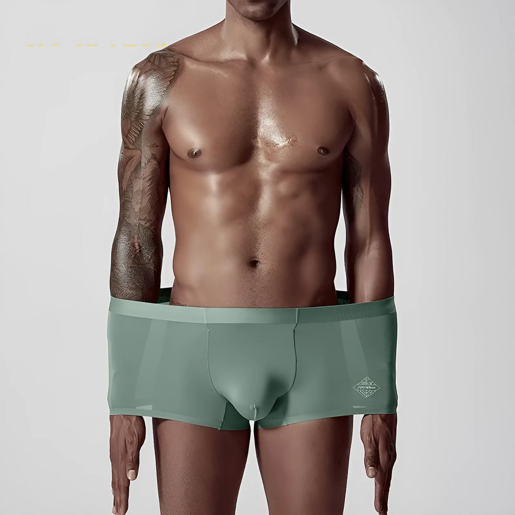 Seamless modal men's underwear in white, pink and green colours with mid waist design