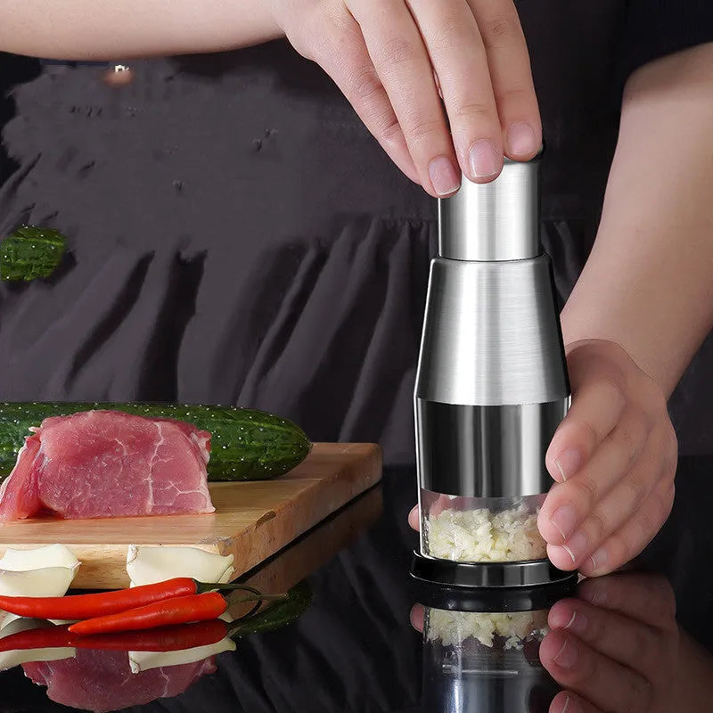 Manual garlic crusher and onion chopper kitchen gadget with stainless steel blades