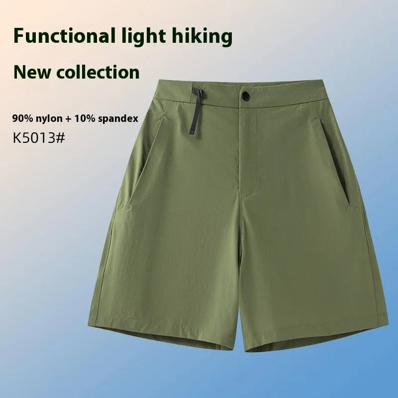 Men's quick-drying sports shorts in khaki colour with a four-sided elastic waistband, shown flat.