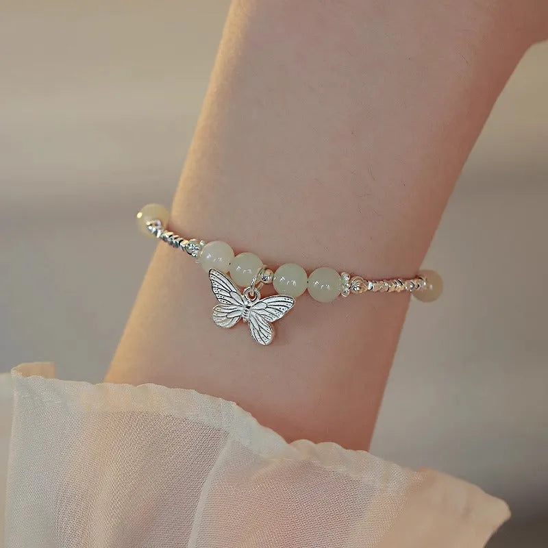 Women's Hetian jade bracelet and necklace set with silver butterfly charms on electroplated copper