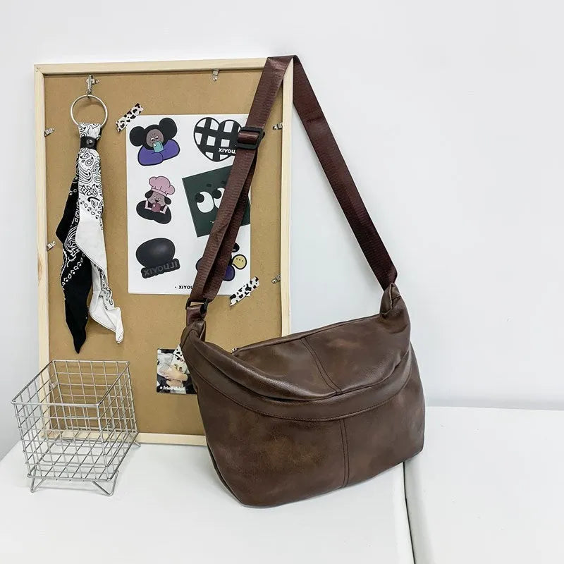 Retro large capacity black PU crossbody bag for men shown with dimensions