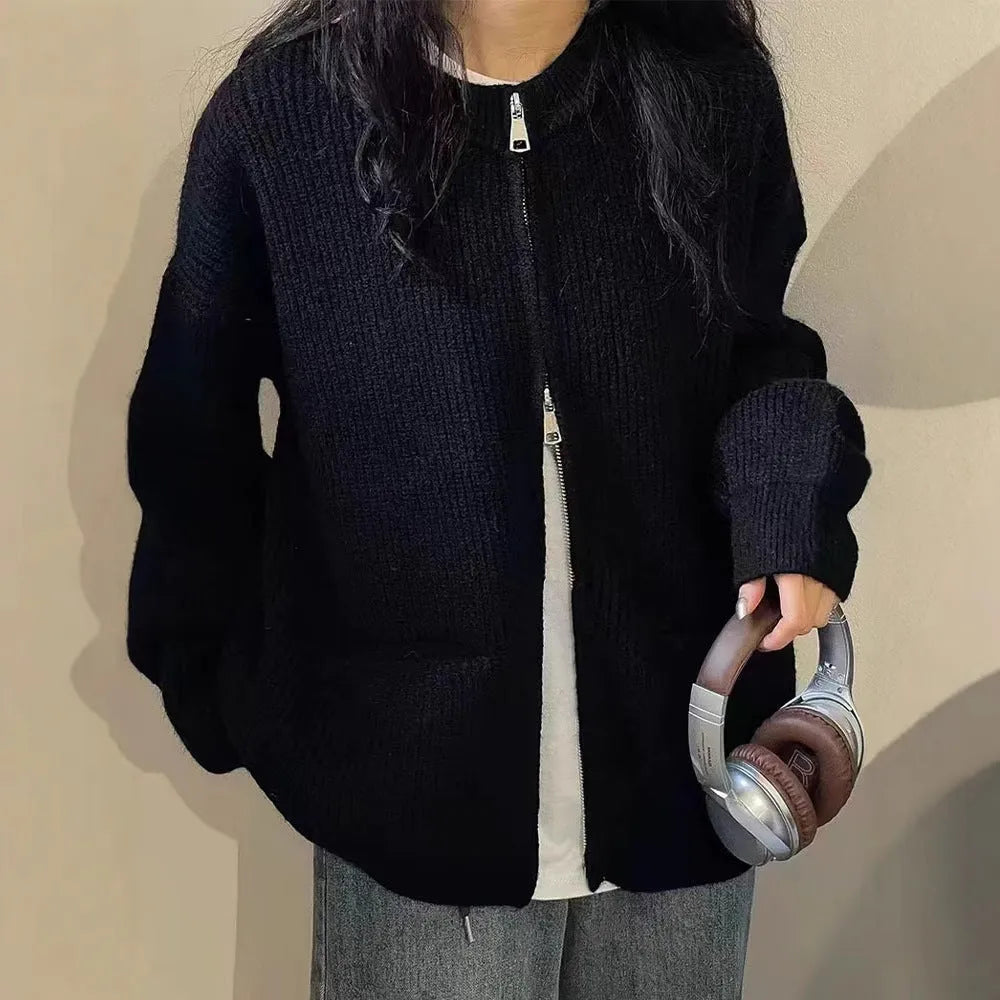Beige viscose soft wind sweater coat, a long sleeve cardigan laid flat.