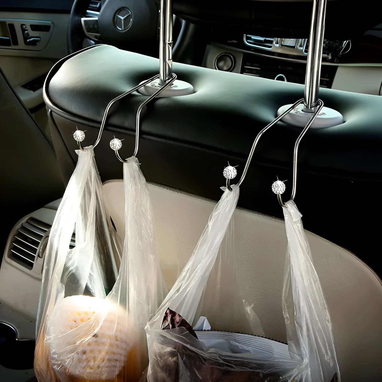 Two stainless steel diamond decorative hooks for car seat organisation in various colours.