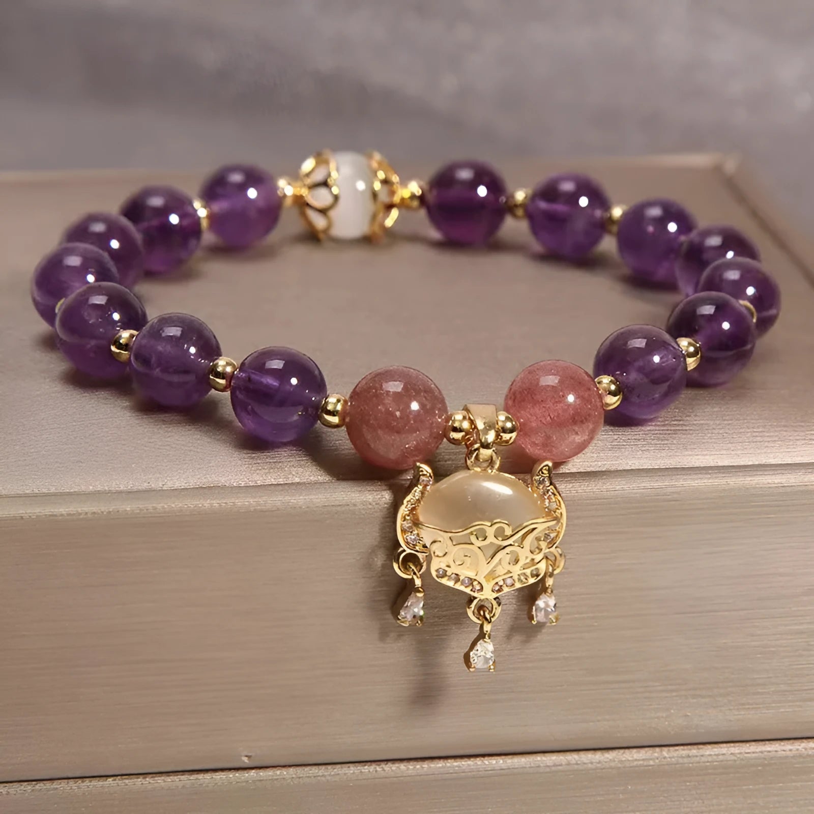 Handmade drop-shaped copper bracelet with a longevity lock charm and Ruyi design for women.