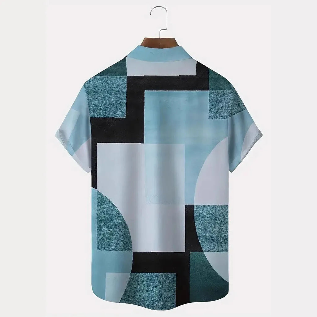 Man wearing a loose-fit short sleeve cardigan with a striped retro geometric pattern in contrasting colours.