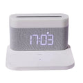 Black and white wireless desktop charger with clock display and ambient lighting functions